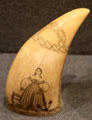 Scrimshaw figure of woman with anchor at New Bedford Whaling Museum. New Bedford, MA.