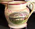 Lusterware pottery jug with view of Iron Bridge over River Weaphen in England at New Bedford Whaling Museum. New Bedford, MA.