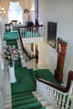Central hallway of Mayflower Society House with stairs to front & back of house. Plymouth, MA.