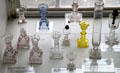 Collection of glass candlesticks & lamps most by Boston & Sandwich Glass Co. at Sandwich Glass Museum. Sandwich, MA.