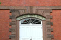 Stone surround of door of Concord Town House. Concord, MA.