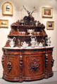 Sideboard carved with symbols of hunt & harvest by Ignatius Lutz of Philadelphia, PA at Museum of Fine Arts. Boston, MA.
