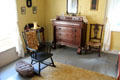 Rocking chair & chest of drawers in Alcott parents' bedroom at Orchard House. Concord, MA.