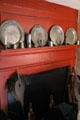 Fireplace with collection of pewter at John Balch Museum House. Beverly, MA.