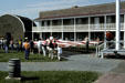 Visitors participate in flag ceremony run by National Park Service at Fort McHenry. Baltimore, MD.
