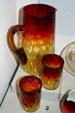 Amberina glass champagne pitcher & tumblers probably by New England Glass Works, Cambridge, MA, in Maine State Museum. Augusta, ME.