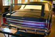 Rear deck of 1972 Lincoln Presidential Limousine with rack for Secret Service at Henry Ford Museum. Dearborn, MI.