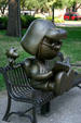 Peanuts characters on bench by native son Charles Schultz in downtown park. St. Paul, MN.