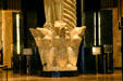 Detail of natives holding sacred pipes at base of "Vision of Peace" carving. St. Paul, MN.