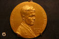 Gold medal commemorating Lindbergh's 1927 New York to Paris flight issued by French Society of St Louis at Missouri History Museum. St Louis, MO.