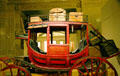 Concord-style Des Moines Palmyra mail coach in History Hall at Missouri State Capitol. Jefferson City, MO