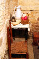 Visitor's chair, pitcher & basin, reading lamp in Frank James cell at 1859 Jail Museum. Independence, MO.