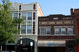 Fechter Hotel with white terra-cotta beside Saunders building. Bozeman, MT.