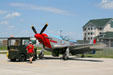 North American P-51D Mustang being moved onto taxiway for test flight at Fargo Air Museum. Fargo, ND.