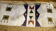 Ogallala Sioux beadwork papoose carrier at Lincoln County Historical Museum. North Platte, NE.