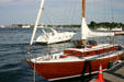 Boats on Piscataqua River with Kittery, ME on far bank. Portsmouth, NH.