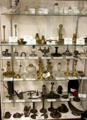 Collection of candlesticks & lamps at Woodman Museum. Dover, NH.