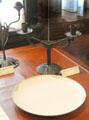 Two-arm electric candelabra by George de Feure over 'Canton' China plate at Stickley Museum at Craftsman Farms. Morris Plains, NJ.