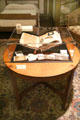 Oak coffee table #645 by Craftsman Workshops of Eastwood, NY displays scrapbook of Marion Stickley at Gustav Stickley Museum at Craftsman Farms. Morris Plains, NJ.