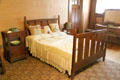 Oak double bed #923 by Craftsman Workshops of Eastwood, NY at Gustav Stickley Museum at Craftsman Farms. Morris Plains, NJ.