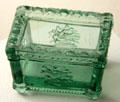 Pressed green glass salt cellar by Jersey City Glass Co. of Jersey City, NJ at Museum of American Glass. Milville, NJ.