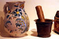 Majolica pitcher from Spain & mortar & pestle from New Mexico in Delgado home display at Museum of Spanish Colonial Art. Santa Fe, NM.