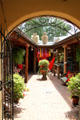 Patio with shops on Paseo del Pueblo Norte. Taos, NM.