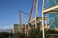 New York, New York Hotel roller coaster structure above hills of Las Vegas. Las Vegas, NV.