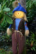 Scare crow in conservatory of Botanical Gardens. Buffalo, NY.