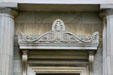Neoclassical detail over door of Buffalo History Museum. Buffalo, NY.