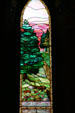 Stained glass windows with pines by Tiffany in Sage Chapel on Cornell Campus. Ithaca, NY.