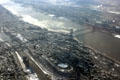 George Washington Bridge & northern end of Manhattan from air with East River crossed by 181st St., Cross Bronx Expressway & High Bridges. New York, NY.