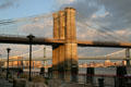 Brooklyn Bridge & Manhattan at sunset. New York, NY.