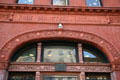 Terra cotta details of Freie Bibliotek u. Lesehalle first building in Manhattan lending books free. New York, NY.