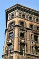 Upper story facade details of Warren Building. New York, NY.