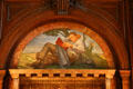 Mural of man reading in New York Public Library. New York, NY.