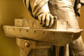 Detail of Robert Fulton statue with model of Manhattan-Brooklyn ferry boat Nassau at Museum of the City of New York. New York, NY.