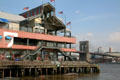South Street Seaport's Pier 17 & Brooklyn Bridge. New York, NY.