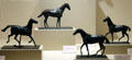 Horses bronze sculptures in a variety of poses by Edgar Degas at Metropolitan Museum of Art. New York, NY.