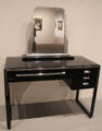 American Modern style vanity table & mirror by Norman Bel Geddes for Simmons Furniture Co. of Chicago, IL at Metropolitan Museum of Art. New York, NY.