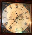 Face of tall clock with bird design & both Roman & Arabic numbers at Home Sweet Home Museum. East Hampton, NY.