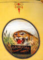 Advertising tiger sign on sleigh from Maine at carriage collection of Long Island Museum. Stony Brook, NY.