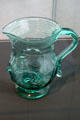 Blown green glass lily pad pitcher probably from New York at Toledo Glass Pavilion. Toledo, OH.