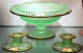 Green glass with enameled decorations at Tiffin Glass Museum. Tiffin, OH.