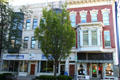 Streetscape along Elyria Square with red Italianate block. Elyria, OH.