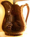 Rockingham pitcher with raised corn relief at Museum of Ceramics. East Liverpool, OH.