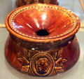 Rockingham spittoon with molded profile of woman at Museum of Ceramics. East Liverpool, OH.