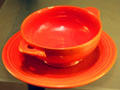 Fiesta ware bowl made orange with uranium oxide glaze by Homer Laughlin China Co. at Museum of Ceramics. East Liverpool, OH.