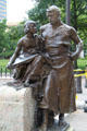 Sculpture of working man mourning assassinated President William McKinley on McKinley Monument at Ohio State Capitol. Columbus, OH.