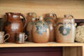 Antique jugs in N.K. Whitney Store at Historic Kirtland Village. Kirtland, OH.